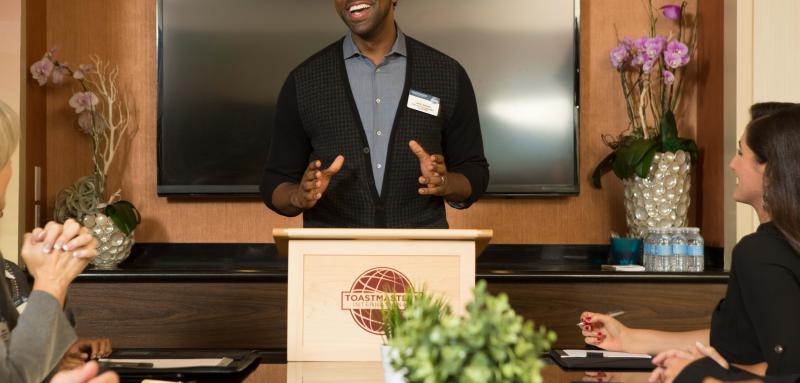 a confident communicator addressing his audience